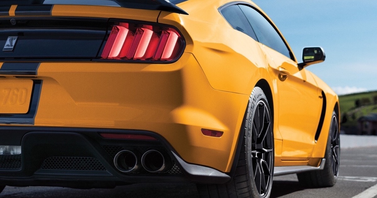 Ford Mustang Shelby GT350 in profile on a mountain road