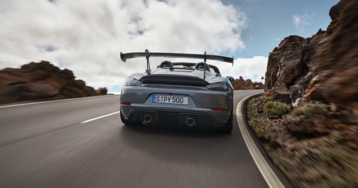 AI-generated rendering of a Porsche 718 Spyder RS wearing the GT4 RS's swan-neck wing